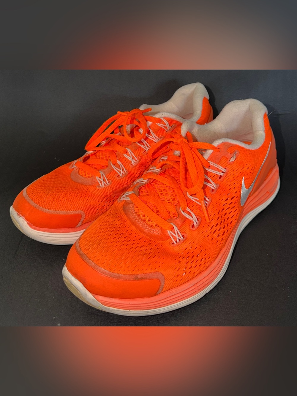 Nike Bright Orange Running Shoes with Silver Swoosh